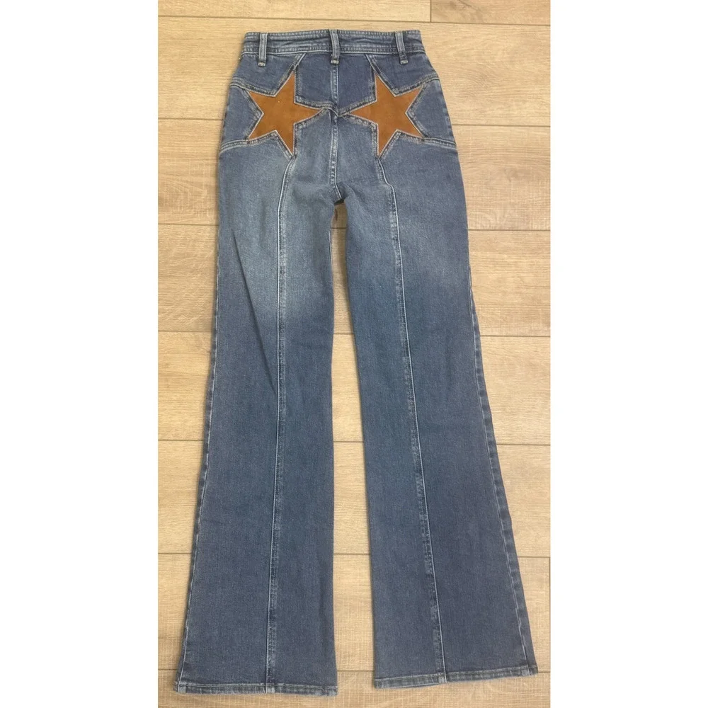 FREE PEOPLE WE THE FREE WESTERN SKYLINE FIRECRACKER FLARE JEANS BROWN STAR 26